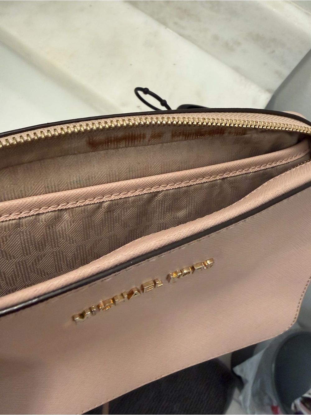 Michael Kors Pale Pink Leather Crossbody Pouch with Gold Hardware